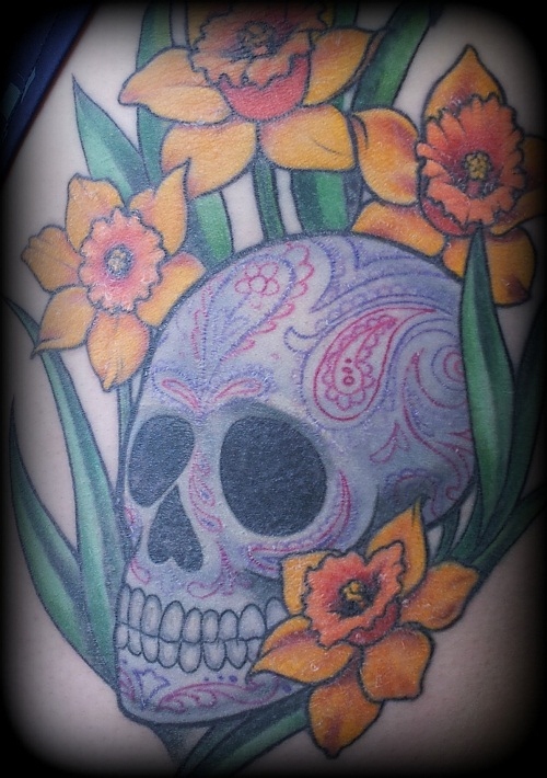 skull and flowers tattoo
